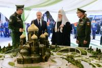The Economist: РФ объединяет свое «ядерное» православия с армией